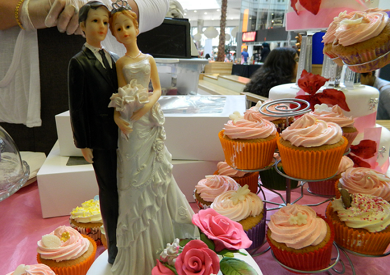 Bride and Groom figures at the Asian Wedding Exhibition at Pavilions Shopping Centre in Birmingham
