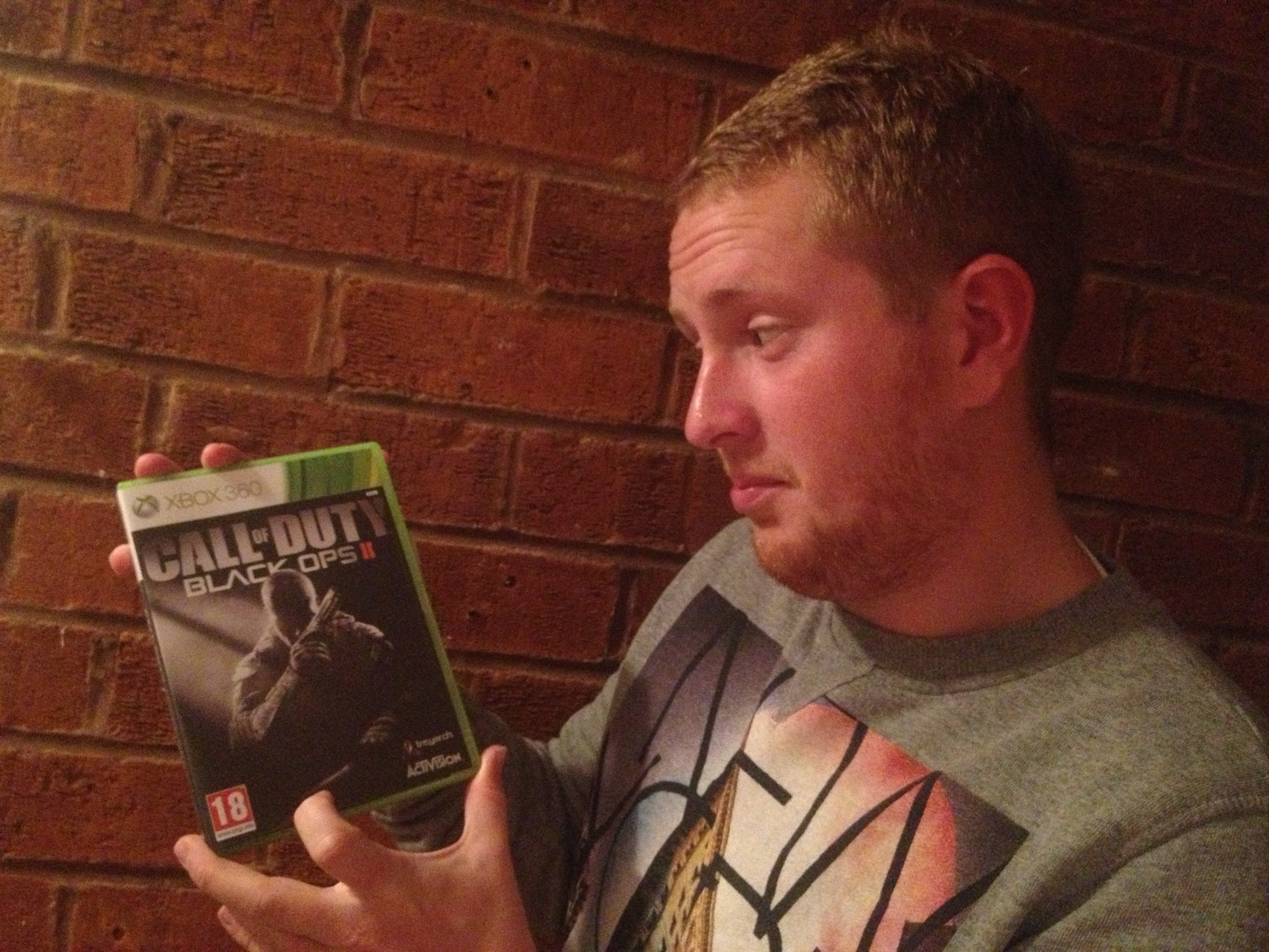 Gaming fan Keiran Loveder, from Sutton Coldfield, with his copy of Call of Duty: Black Ops II