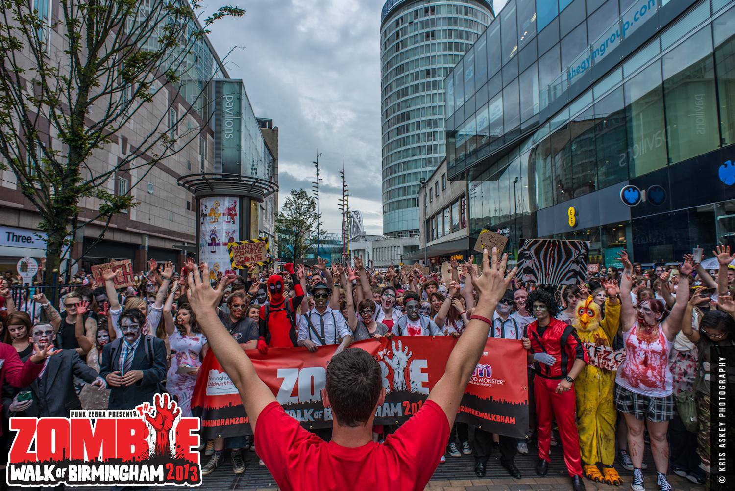 The zombie horde take to the city streets outside the Birmingham bullring (Photograph: Kris Askey)