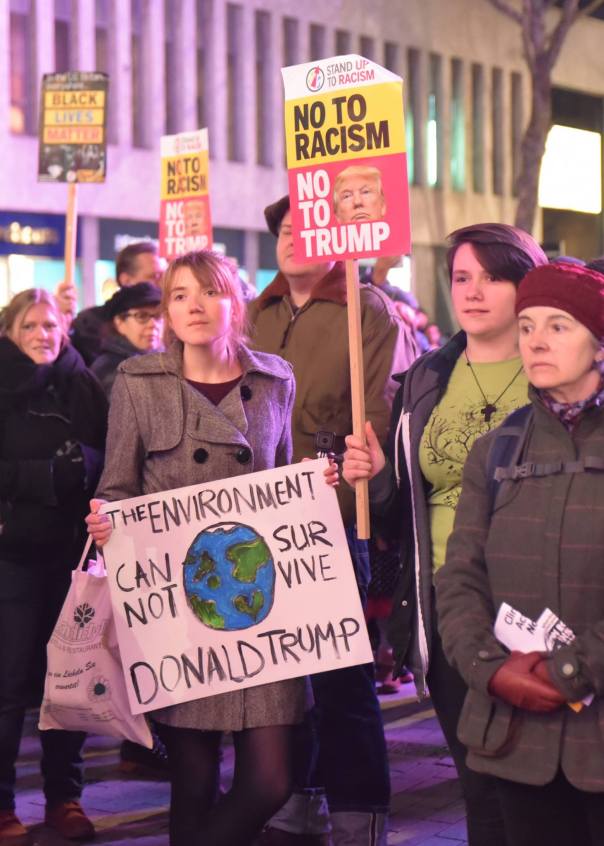 Anti Donald Trump protesters displaying banners in High Street in Birmingham city centre (Photograph: Geoff Dexter)