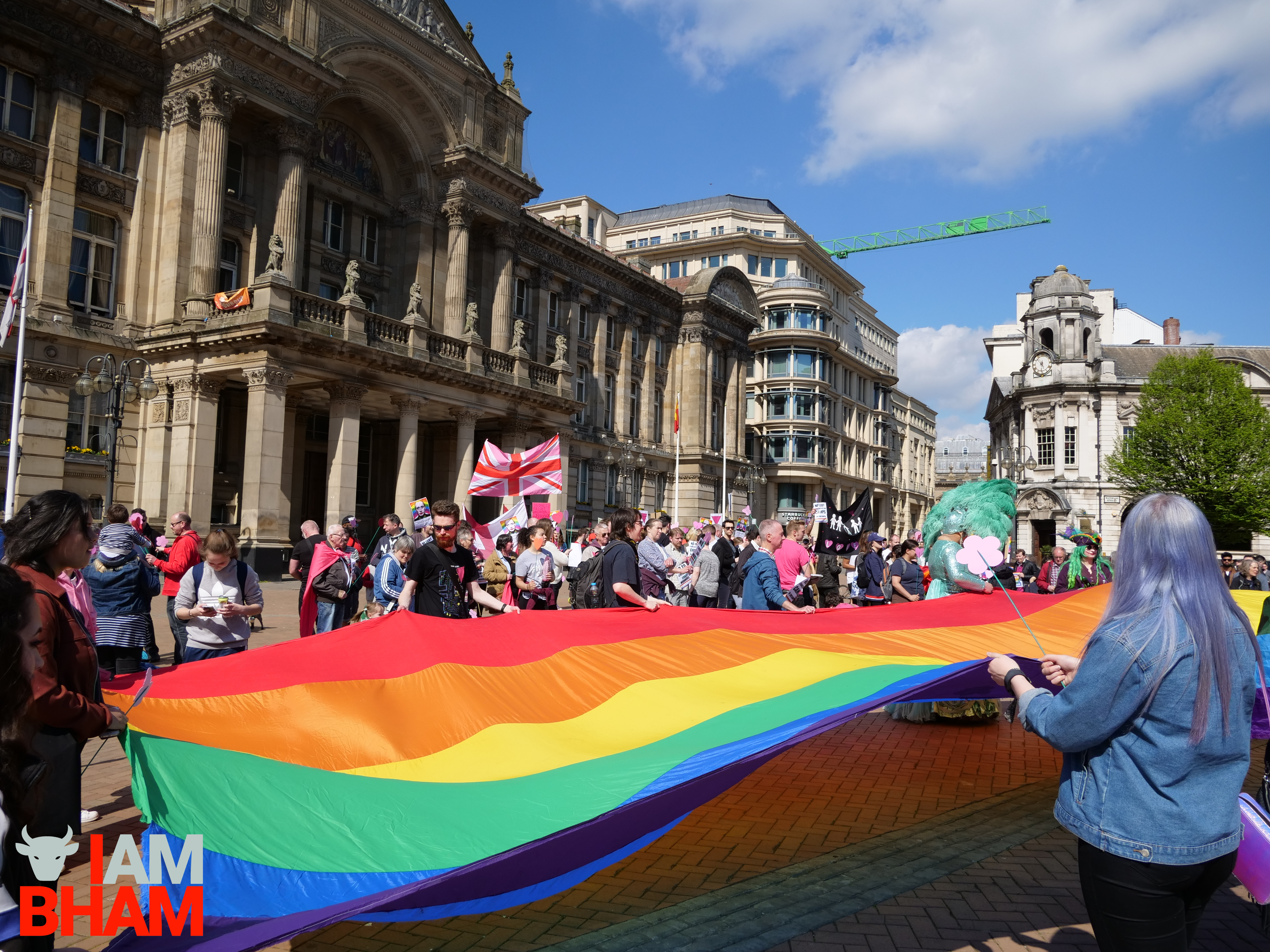 A large LGBT rainbow flag was unfurled in Victoria Square during the solidarity rally (Photograph: Adam Yosef)